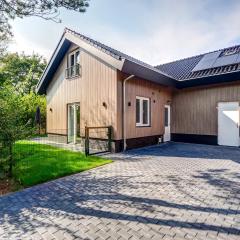 Modern holiday home on Dutch coast with garden