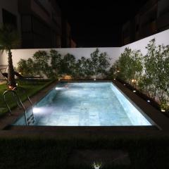 Dar Bouazza Luxury apartment with pools garden sports courts parking near the sea