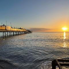 PINK HOUSE ,Opposite PIER & Beach ,SLEEPS 6 , 2 BEDROOM GROUND FLOOR SELF CONTAINED GARDEN FLAT , PRIVATE ENTRANCE , KITCHEN , Guaranteed Parking ,Wifi , Movies ,Bathroom ,fridge , microwave ,BEDROOM 1, DOUBLE BED & 2 SINGLE BEDS ,BEDROOM 2 , DOUBLE BED