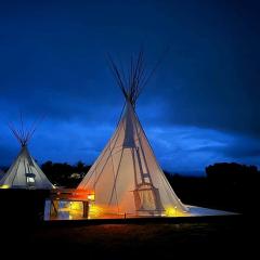 Rustic Elegance: Tipi Glamping by Wind River Mountains in Fort Washakie