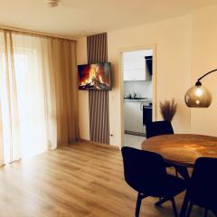 Modernes 2-Zi Apartment mit Terrasse und Garten