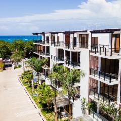 Tropical Getaway with pool & steps to the beach