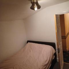 Cozy King Room with Shared Kitchen & Bathroom