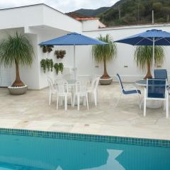 Casa Espaçosa com 5 Quartos Piscina Privativa 300m da Praia Ar condicionado em todos cômodos