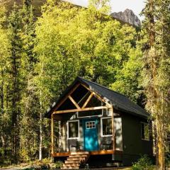Picturesque Cabin Nestled Amidst Trees in Anchorage, Alaska