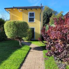 Ferienhaus an der Brunnenaue 4 Sterne, E-Ladestation am Haus, Wlan, Netflix, Garten