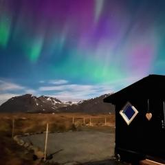 Tiny Cabin Under the Northern Lights
