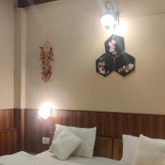 Nayantaara by lake & woods