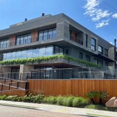 Aconchegante studio com vista lagoa e serra, perto do mar