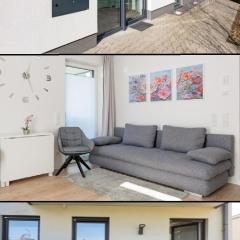 Modernes Apartment mit Terrasse & Garten, Parkplatz & Self-Check-in