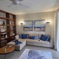 Chic poolside haven 3BR steps from the beach