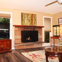 Spacious retreat with 5 bedrooms full kitchen, fenced sports court, free parking