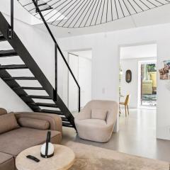 Two-story apartment with private exit to backyard