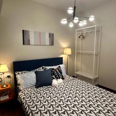 Chic 1BR Condo With Mid-Century Charm & Balcony View