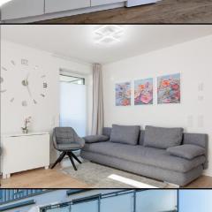 Modernes Apartment mit Terrasse & Garten, Parkplatz & Self-Check-in