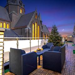 Penthouse with a Neo-Gothic Parish church view