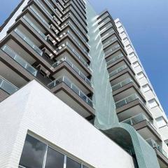 Apartment com Piscina 2 quadras da beira-mar