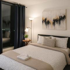 Spacious Urban 2BR Suite Steps from Entertainment District