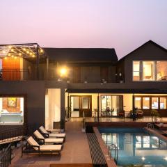 StayVista at Villa Aera with Pool, Lawn