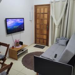 Casa confortável 3 min praia com wifi, churrasqueira e rede de descanso