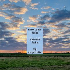 Ferienhaus Robbenglück in Tossens - Ihr gemütliches Zuhause an der Nordsee