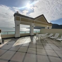 Cobertura aparthotel frente ao mar