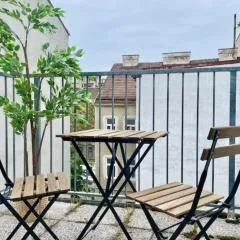 Rooftop Central Apartment with Balcony & Parking