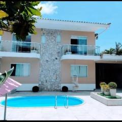 Casa com pisicna Pé na Areia 50m do mar