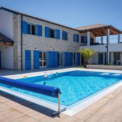 Villa Blue Moon for 9 persons near Porec with 42 m2 heated pool, wellness, kids playground & sea view