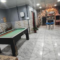 Quarto em casa de família