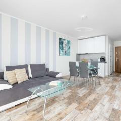 Seaside Apartment with a Swimming Pool and Sauna Close to the Beach in Kołobrzeg by Noclegi Renters