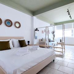 Modern comfort and city vibes just steps from Athe