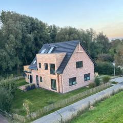 Deichkoje12 Deck 1 EG direkt am Eiderdeich nur 7 km bis zur Nordsee und 20 Min bis Sankt Peter Ording