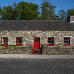 Cosy stone cottage on the shores of Sneem River