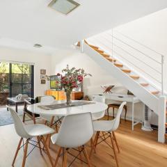 Spacious 2-Bed Townhouse with a Lush Courtyard