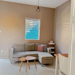 Cosy Guacamaya Azul, Otrobanda