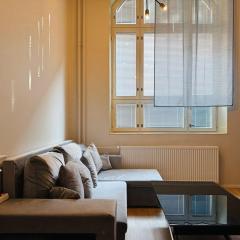 Double Sofa Bed in a Stunningly Tall Shared Studio