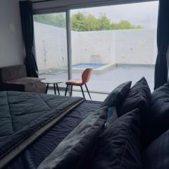 Casa Oceanus - Pool View Room - Ganpatipule