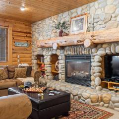 Mountain Charm Stone Fireplace Chefs Kitchen Balcony Cedar Ridge by AvantStay