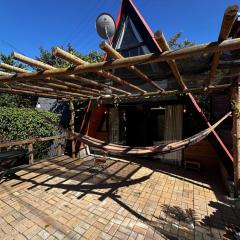 Chalé às margens da represa