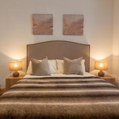 Elegant Neutral Bedroom with Ambient Lighting