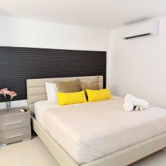 Villa Martha A2 Downtown with a king-size bed and laundry