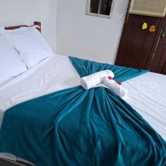 Quarto aconchegante com banheiro privativo