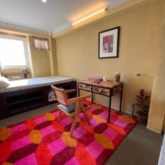 Warm Pink Rooftop apartment with Boudha View