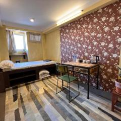 Flowers on the Wall by Boudha Stupa