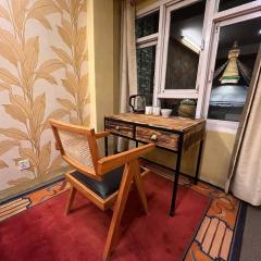 Rich Red Carpet room with a Boudha view Balcony