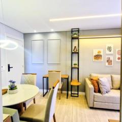 Apartamento 1402 com 2 quartos, sala, cozinha completa, garagem, lazer e portaria 24h