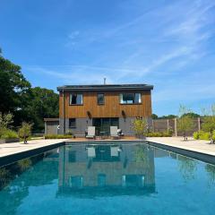 Modern Home with Large Pool & Cosy Wood Burner