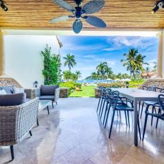 Stylish Split-Level Condo with a Shaded Terrace, Direct Beach Access, and Resort-Style Community Amenities