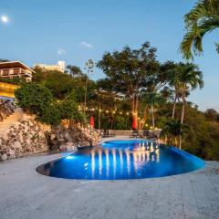 Stunning Mountaintop Property with Stylish Main Home, Private Guesthouse & Infinity Pool